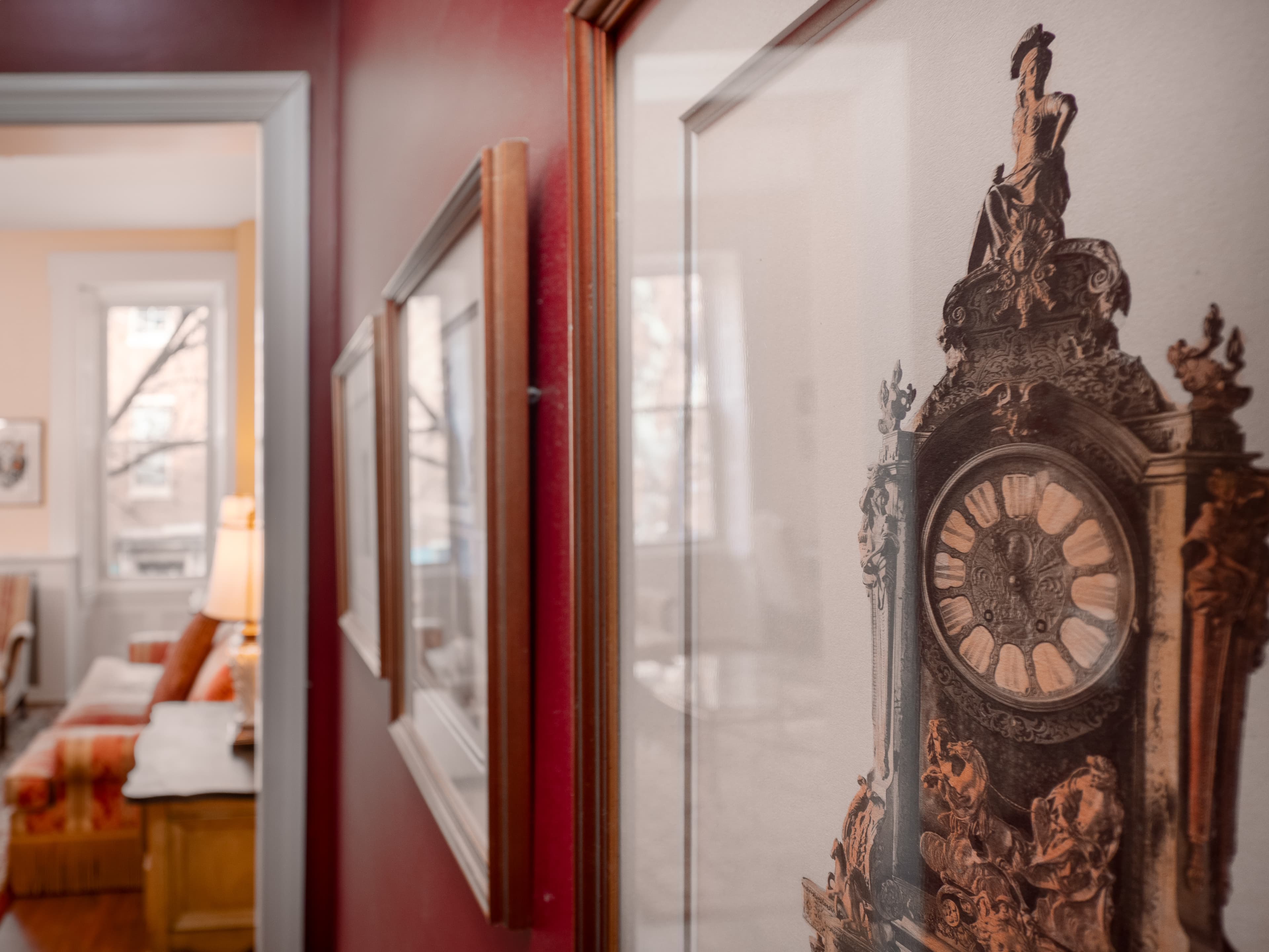 Detail shot of the pictures on the wall in long hallway that leads to the living room.